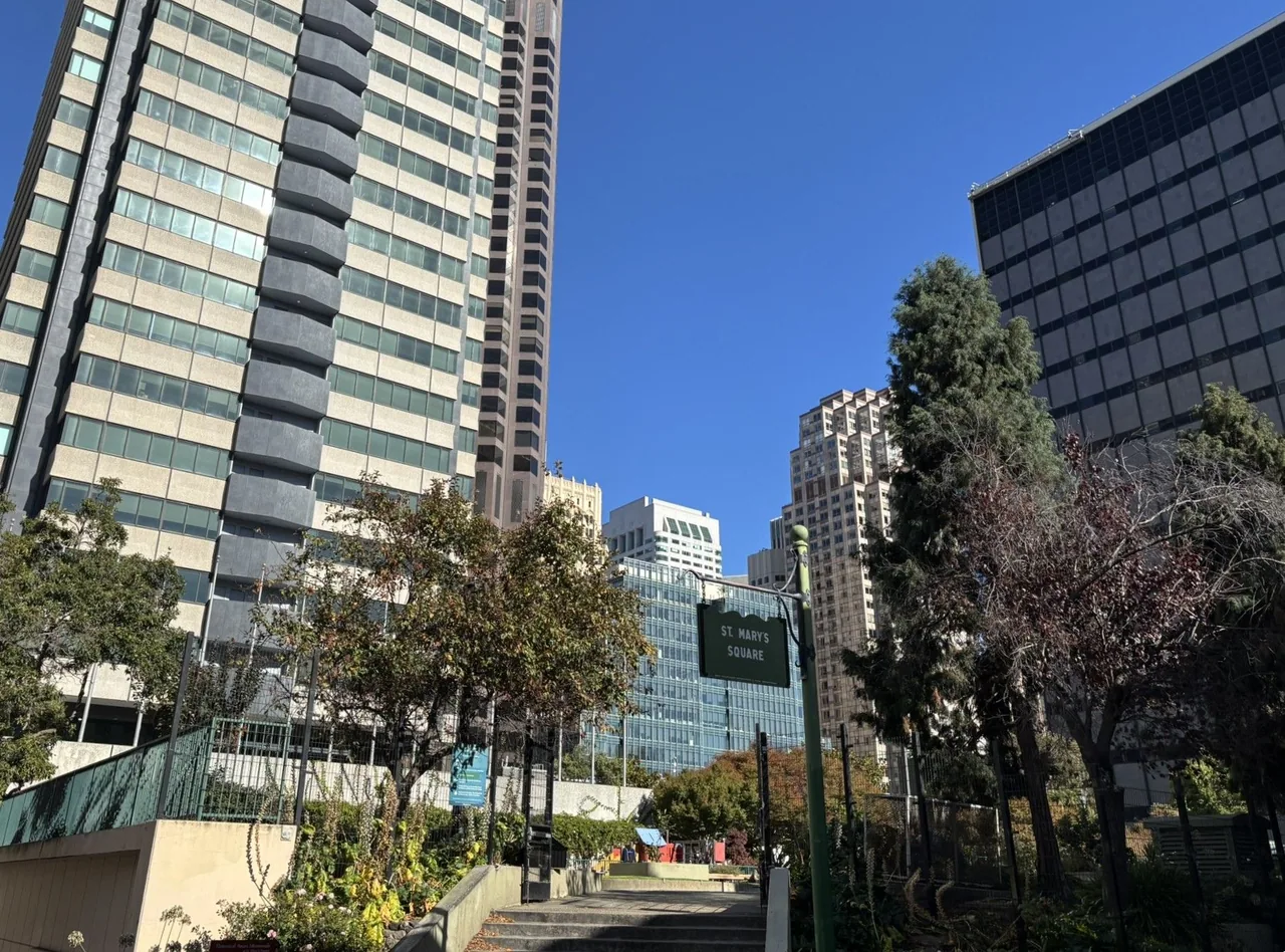 Large buildings hover around the northwest entrance to St. Mary's Square.